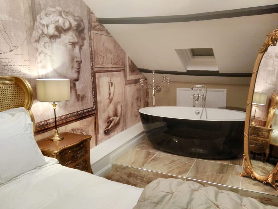 Signature Loft, 1 King Bed (Castle Keep - Top floor, Stair access) | Bathroom | Designer toiletries, hair dryer, bathrobes, slippers