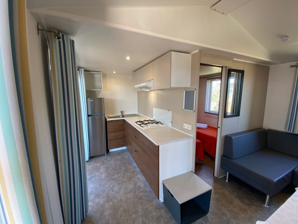 Deluxe Mobile Home, 2 Bedrooms, Sea View | Private kitchen | Fridge, cookware/dishes/utensils