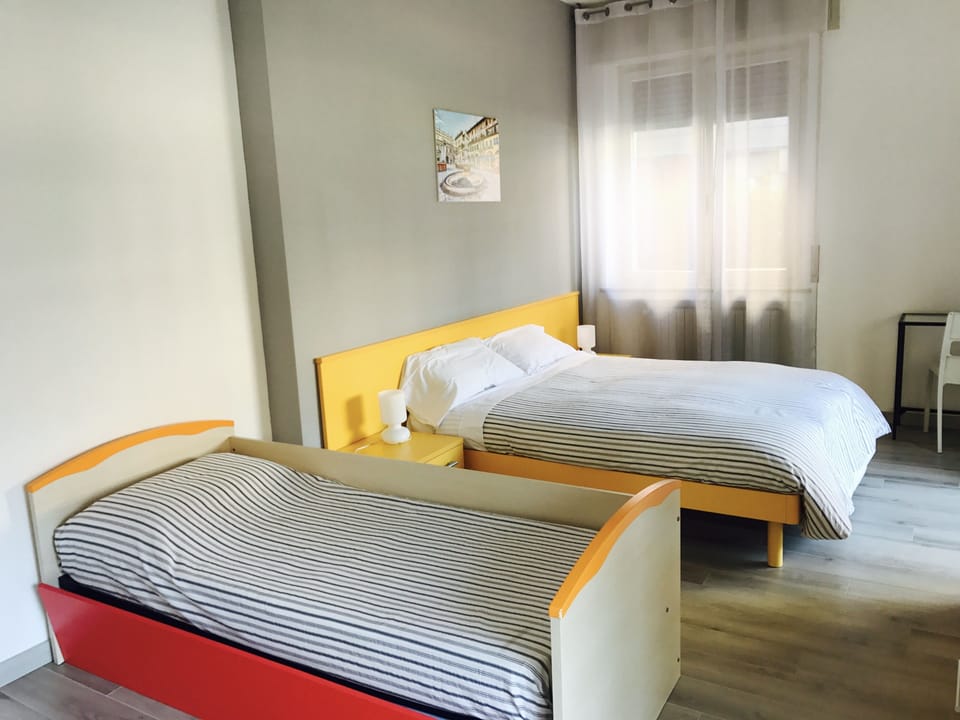 Basic Triple Room, 1 Bedroom, Shared Bathroom | Individually decorated, individually furnished, free WiFi, bed sheets