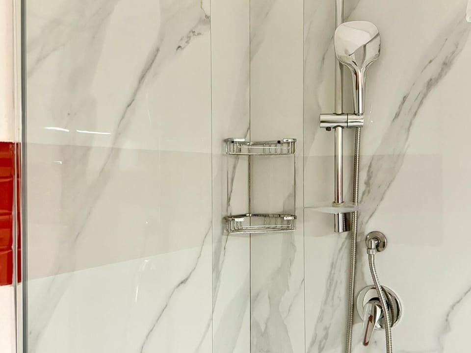 Shower, free toiletries, hair dryer, towels