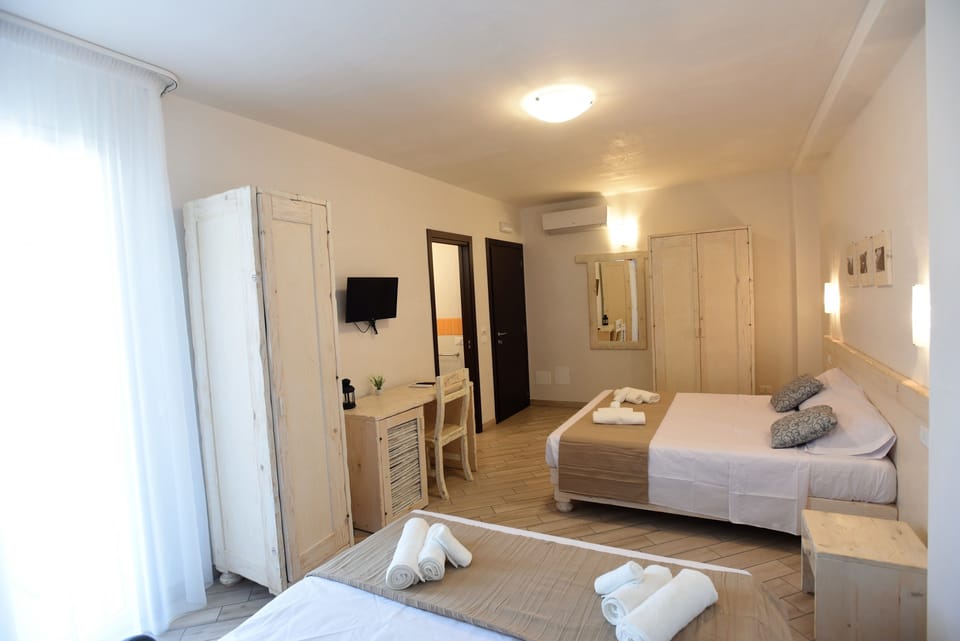 Quadruple Room | Egyptian cotton sheets, premium bedding, memory foam beds, free minibar
