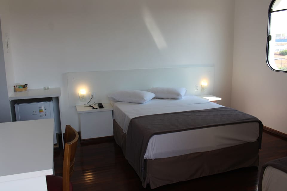 Family Triple Room | Minibar, desk, blackout drapes, free WiFi