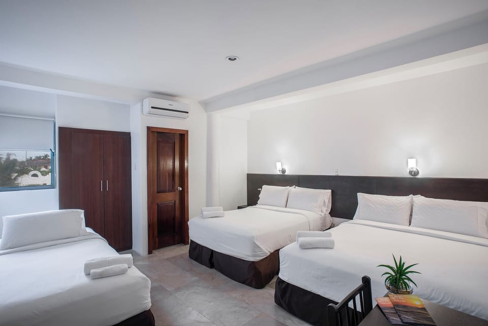  Habitación familiar | Blackout drapes, iron/ironing board (on request), WiFi (free)