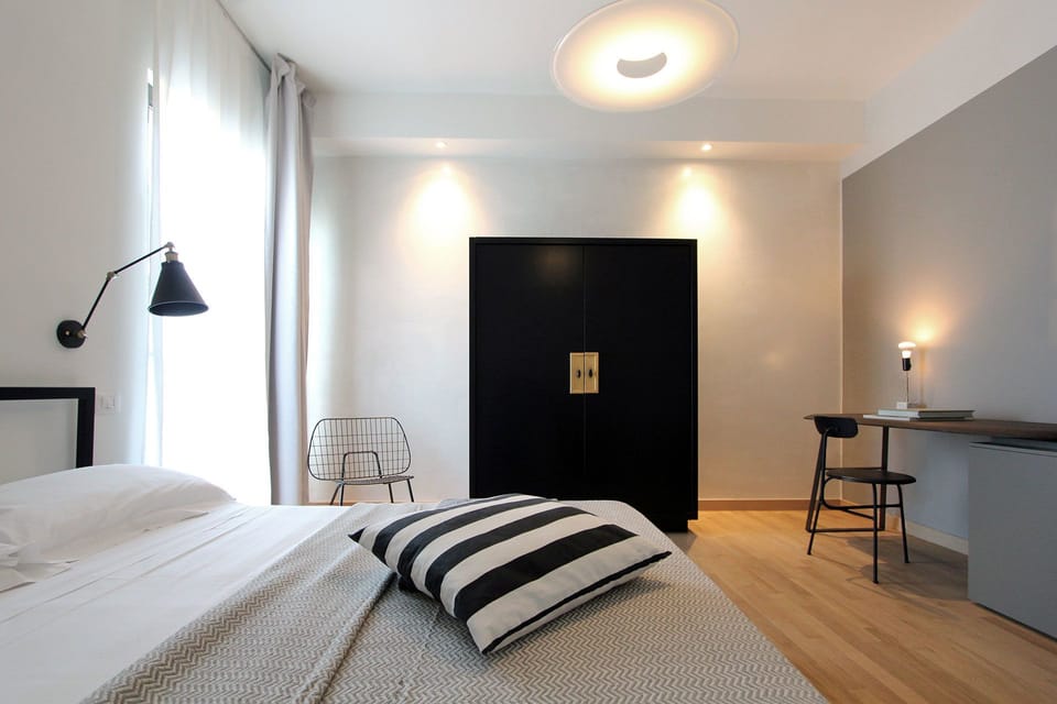 Superior Double Room, Balcony, Partial Lake View | In-room safe, individually decorated, individually furnished