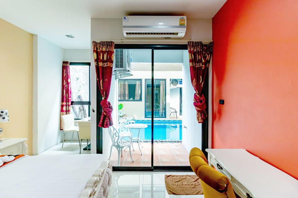 Double Room, Pool View | Desk, laptop workspace, blackout drapes, free WiFi