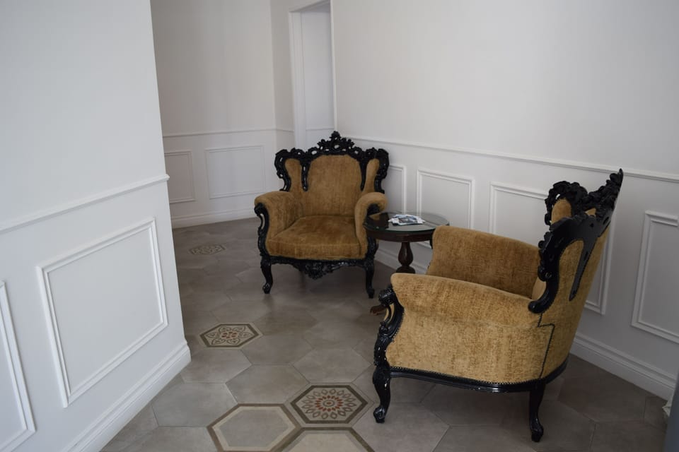 Suite, Balcony | Bathroom | Free toiletries, hair dryer, slippers, towels