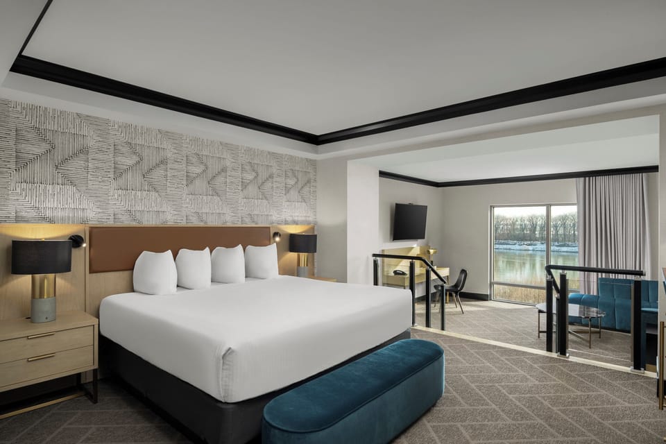 Premium Suite | 1 bedroom, premium bedding, in-room safe, blackout drapes