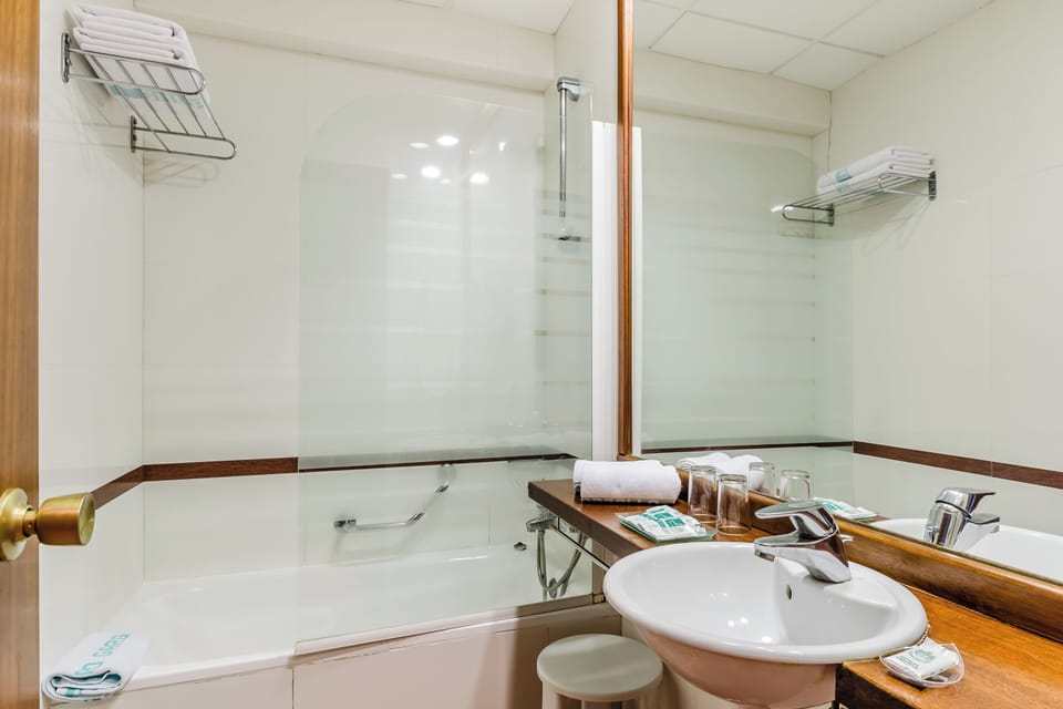 Eco-friendly toiletries, hair dryer, towels
