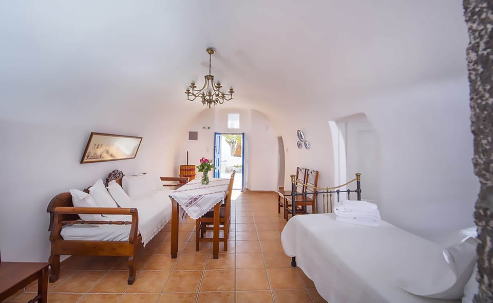 Traditional Villa, Jetted Tub, Sea View (Yposkafo) | Living area | Flat-screen TV