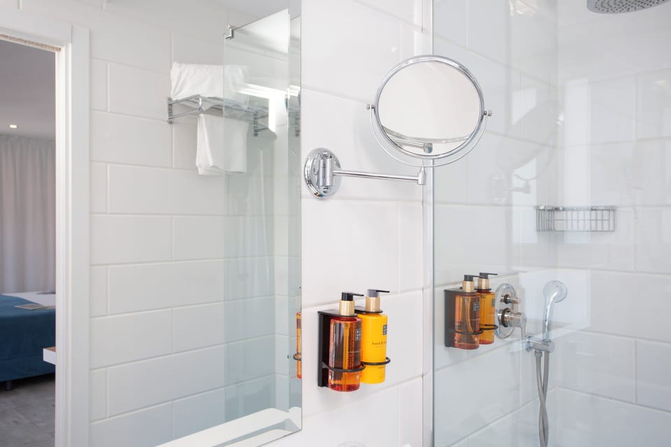 Shower, free toiletries, hair dryer, towels