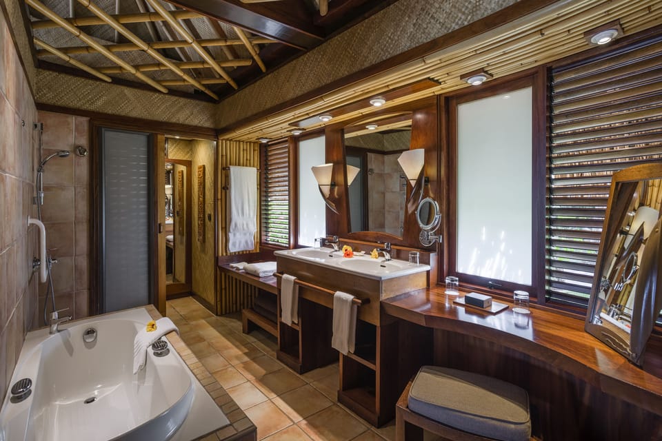 Bungalow, 1 King Bed, Lagoon View (Beach) | Bathroom | Separate tub and shower, deep soaking tub, free toiletries, hair dryer