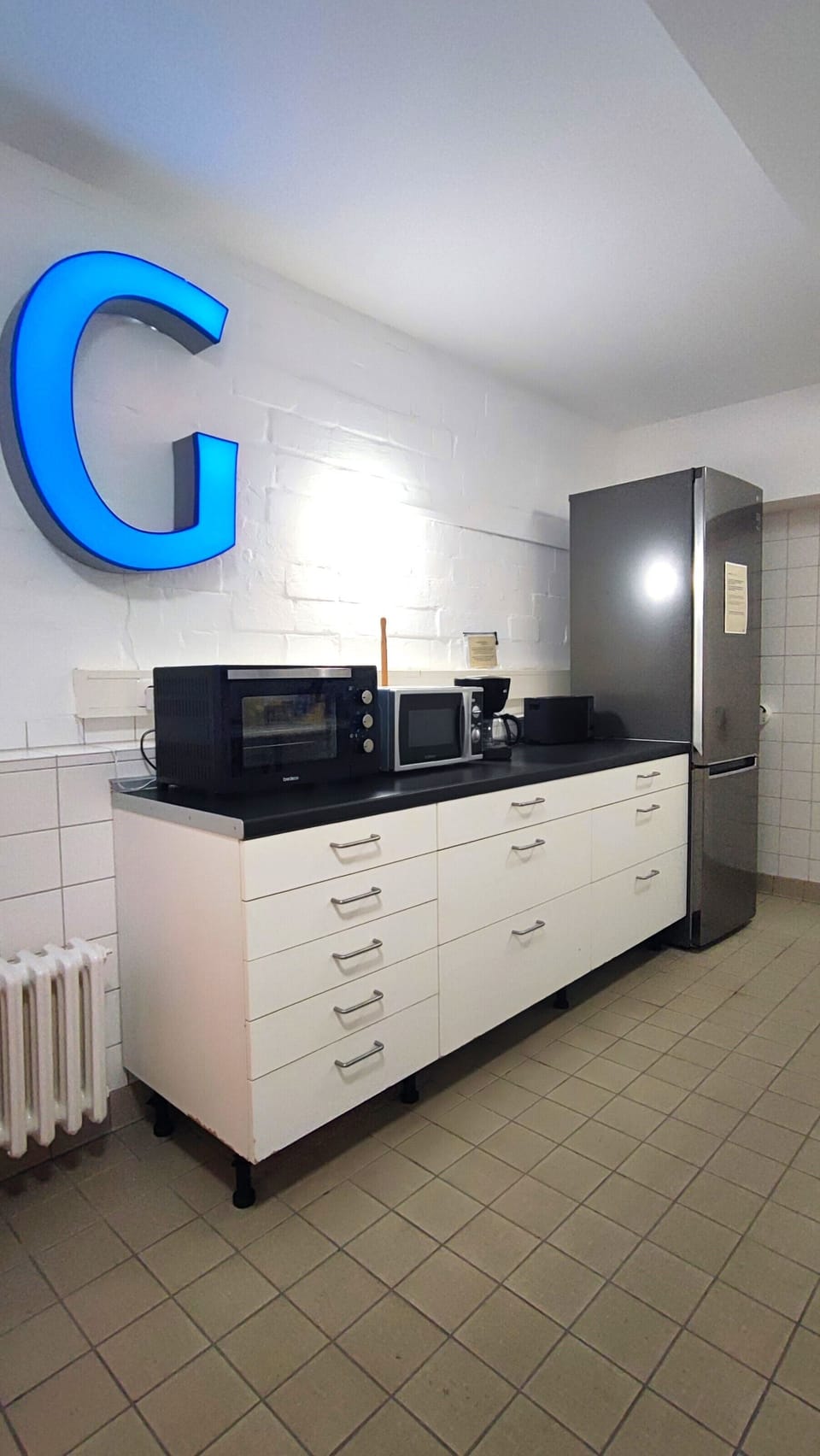 Basic Shared Dormitory, Mixed Dorm, Shared Bathroom (6 Beds) | Private kitchen | Shared fridge, microwave