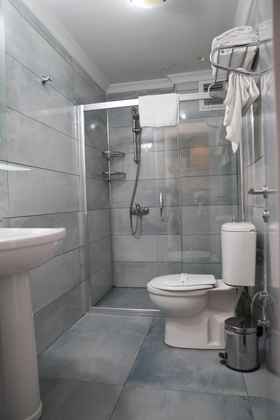 Shower, free toiletries, hair dryer, slippers