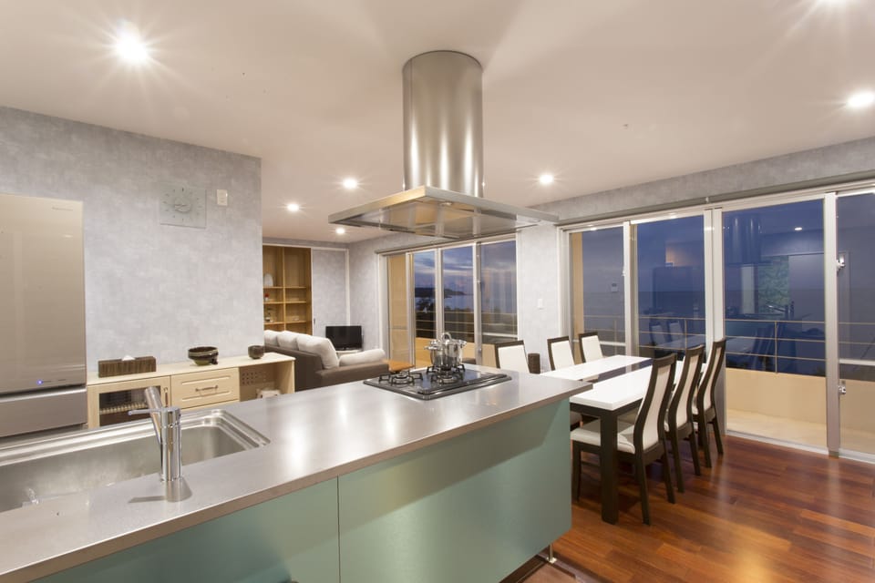 Deluxe Villa | Private kitchen | Full-size fridge, microwave, stovetop, dishwasher