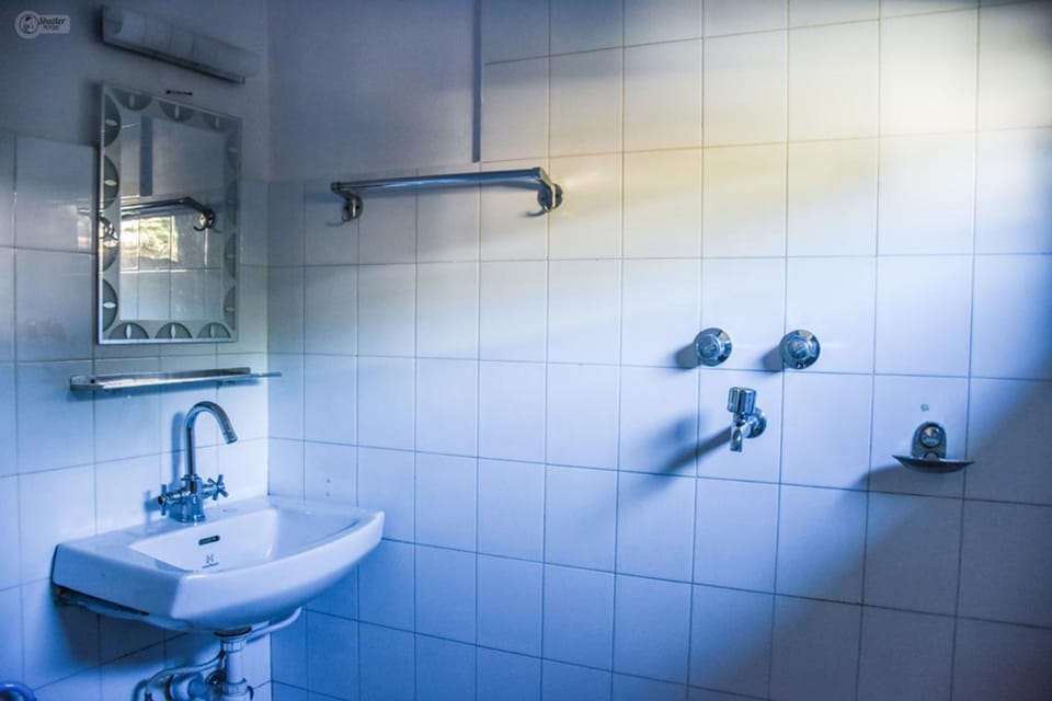 Shower, free toiletries, slippers, towels