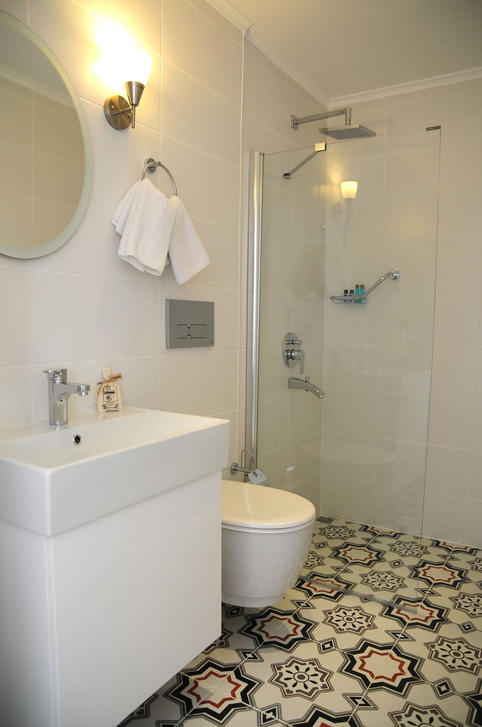 Shower, free toiletries, hair dryer, slippers
