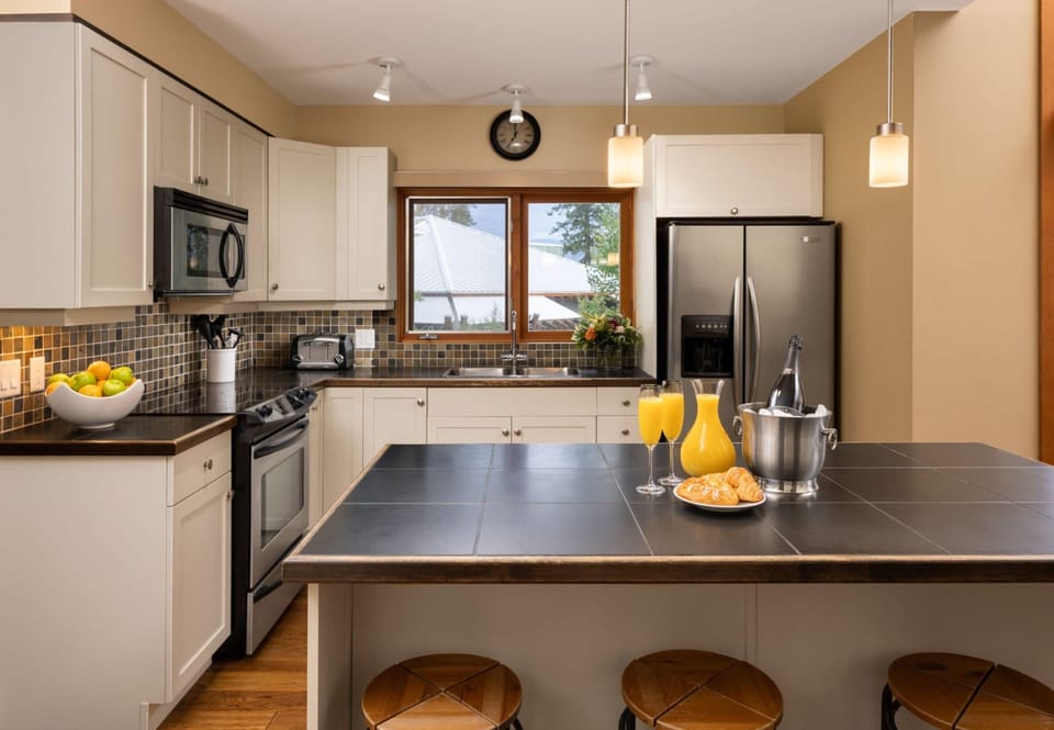 Three Bedroom Trout Lake Townhome | Private kitchen | Coffee/tea maker, full-size fridge, microwave, oven