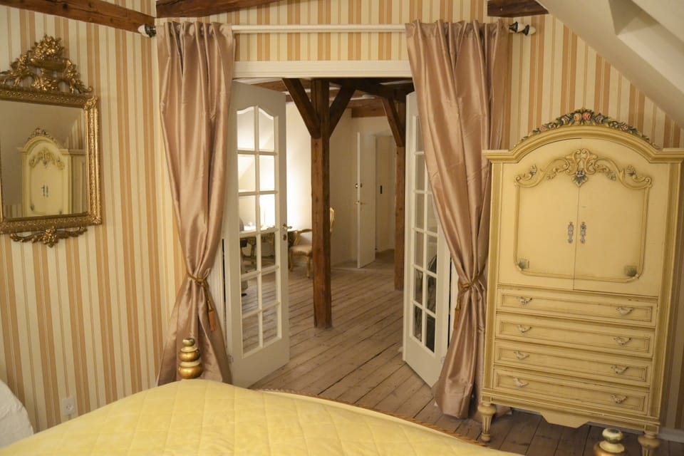 Deluxe Suite, 1 King Bed with Sofa bed, Balcony, Beach View | Individually furnished, free WiFi, bed sheets