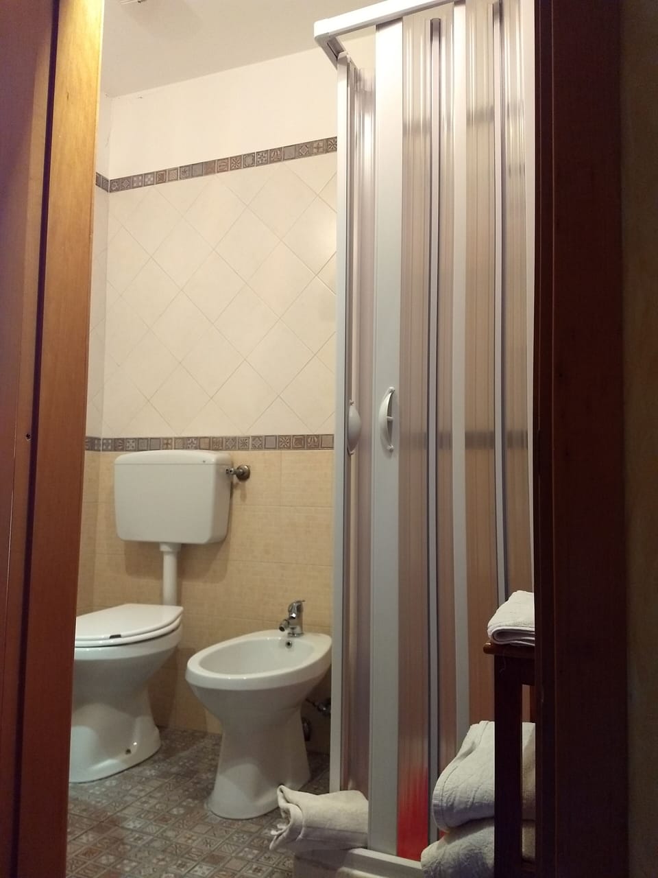 Superior Triple Room, Multiple Beds | Bathroom | Shower, hair dryer, bidet, towels