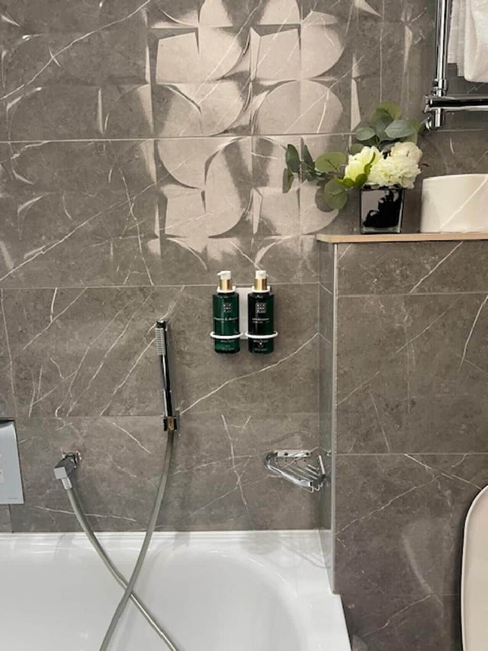 Bathroom | Designer toiletries, hair dryer, bathrobes, slippers