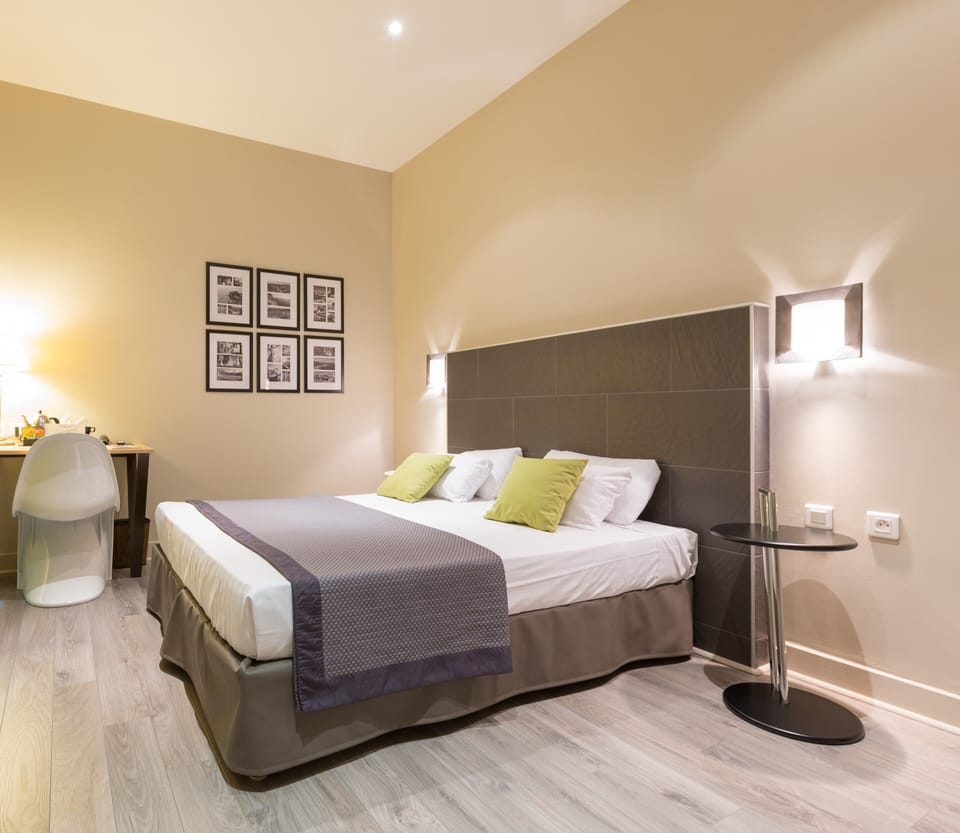 Double room, Courtyard | In-room safe, desk, laptop workspace, blackout drapes