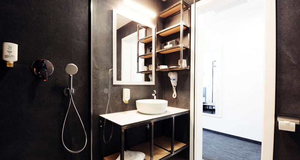 Shower, free toiletries, hair dryer, towels