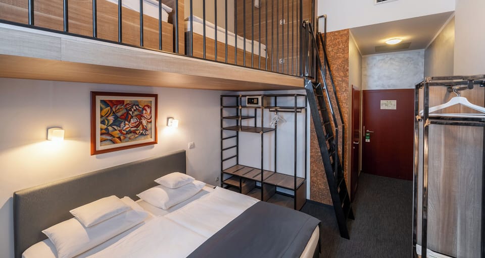 Family Loft, Multiple Beds | Premium bedding, down comforters, pillowtop beds, minibar