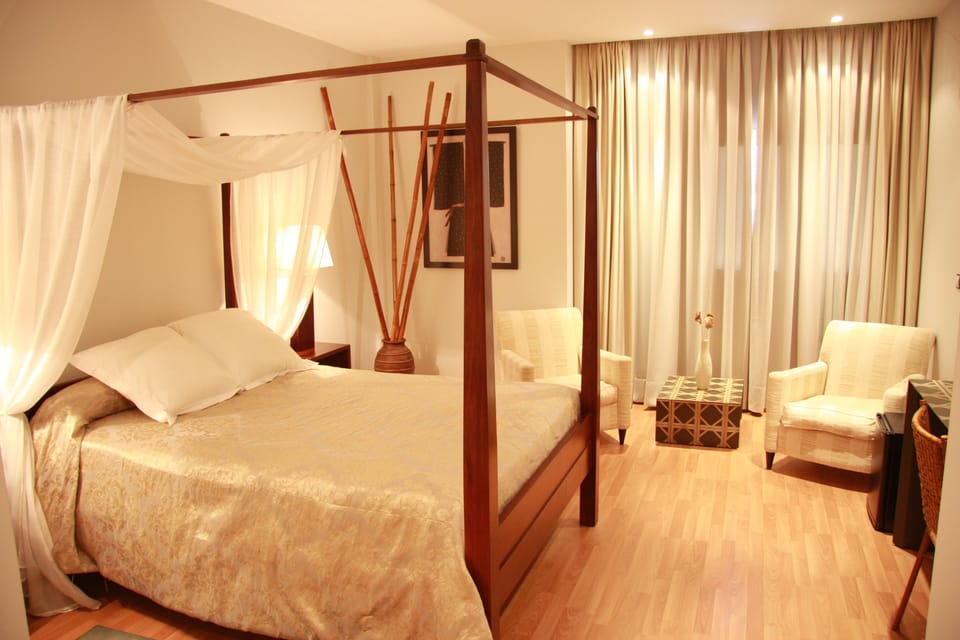 Junior Suite, Jetted Tub | Minibar, in-room safe, desk, laptop workspace