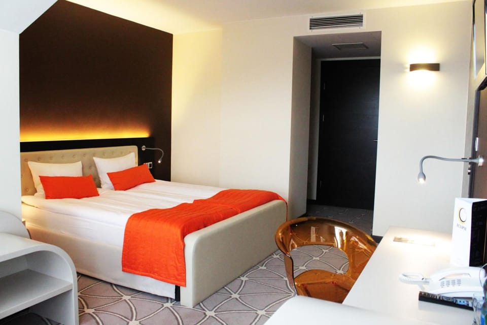 In-room safe, desk, iron/ironing board (on request), cribs (surcharge)