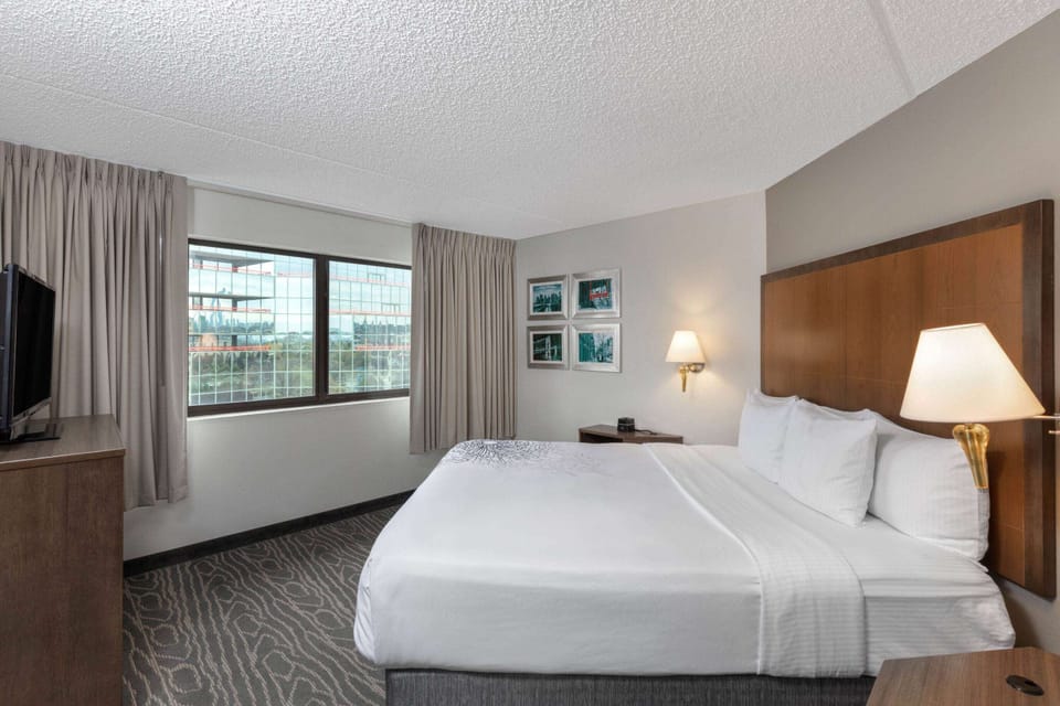 Suite, 1 King Bed, Non Smoking | Desk, blackout drapes, iron/ironing board, free cribs/infant beds