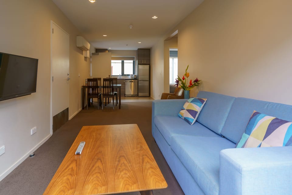 Superior Two Bedroom Apartment | Living room | Flat-screen TV, fireplace