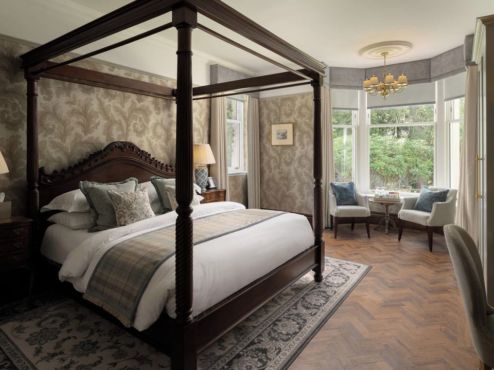 Luxury Suite, 1 King Bed, Garden View | Premium bedding, minibar, in-room safe, individually decorated