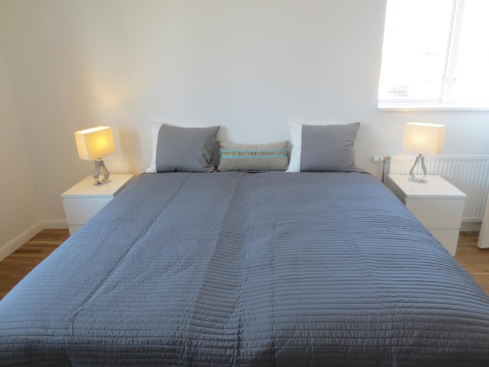 Premium bedding, pillowtop beds, desk, laptop workspace