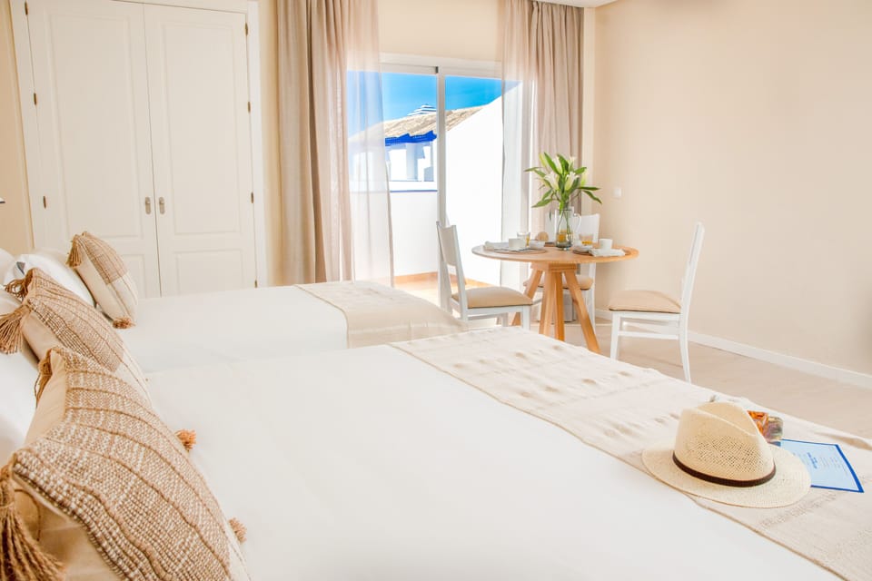 Deluxe Triple Room | Premium bedding, memory foam beds, in-room safe, laptop workspace