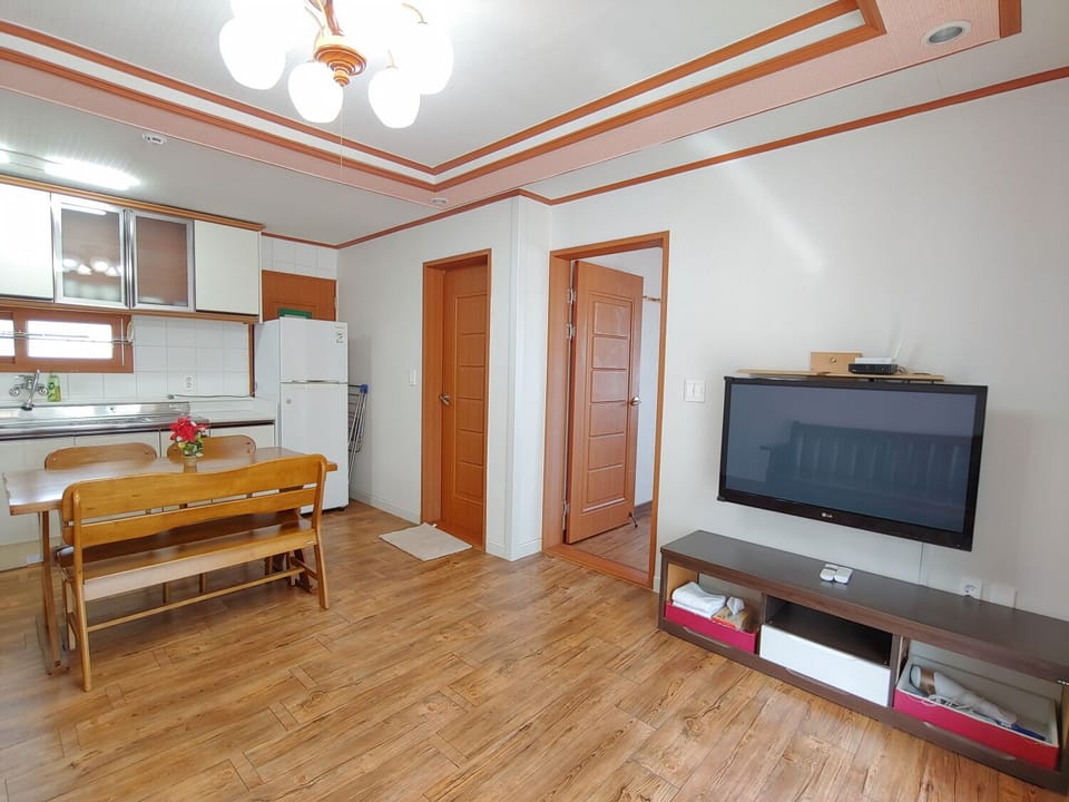 Family Room, 2 Bedrooms (79 sqm) | Living area | Flat-screen TV