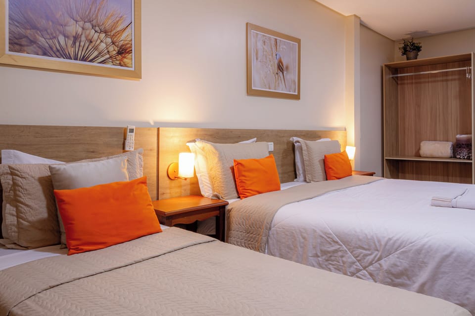 Family Apartment, Ensuite (Suite Exterior 03) | Premium bedding, desk, blackout drapes, rollaway beds (surcharge)