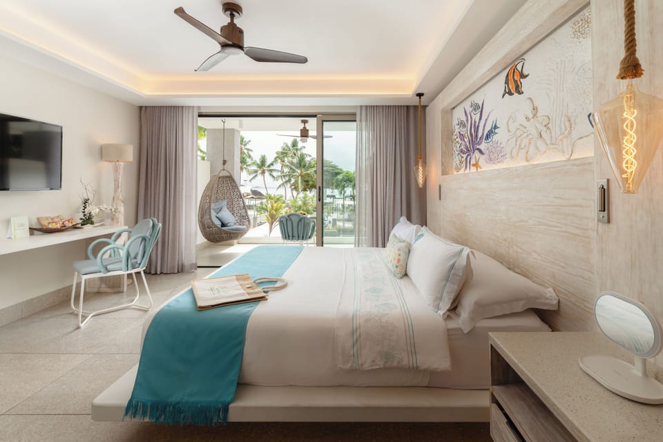 Ocean Room - Adults only | Minibar, in-room safe, desk, iron/ironing board (on request)