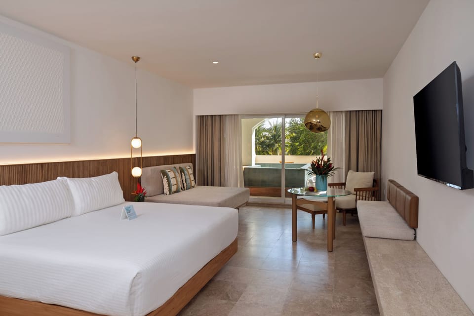 Junior Suite Soaker Tub , Adult Only | Free minibar, in-room safe, blackout drapes, iron/ironing board