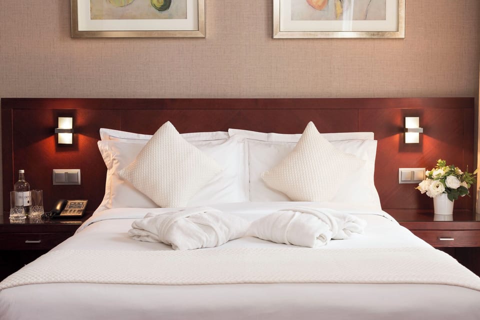 Balcony Suite | Hypo-allergenic bedding available, pillowtop beds, in-room safe, desk