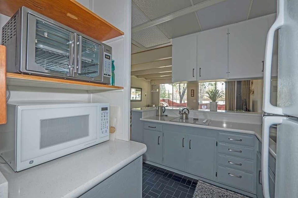 Condo, 1 Bedroom | Private kitchen | Full-size fridge, microwave, stovetop, dishwasher