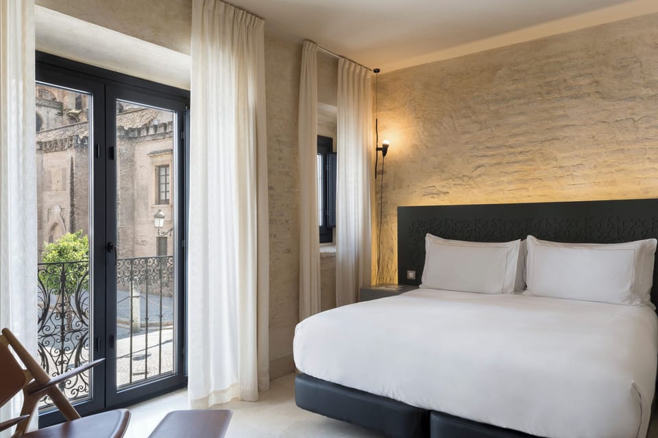 Premium bedding, down comforters, minibar, in-room safe