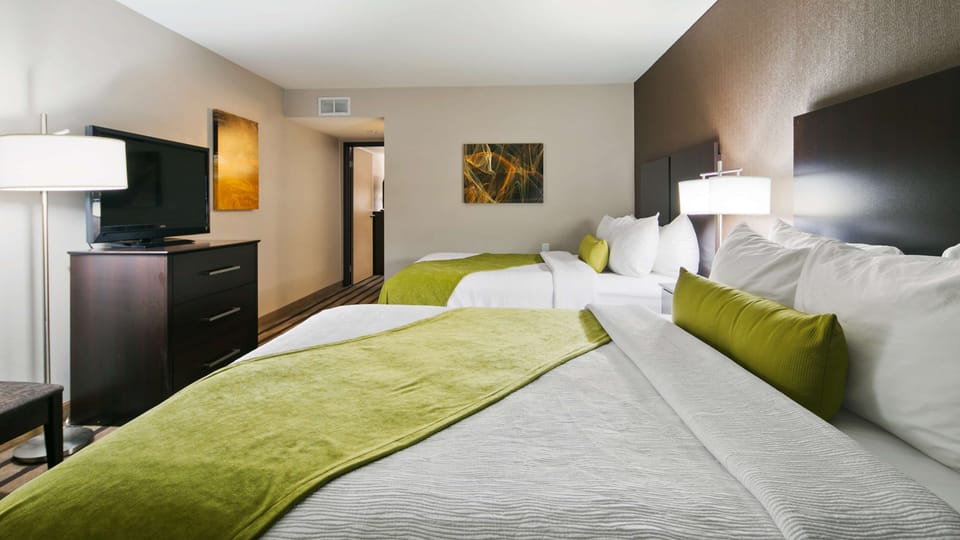 Premium bedding, pillowtop beds, desk, blackout drapes