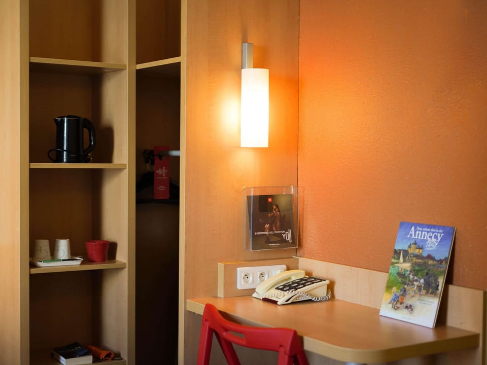 Premium bedding, desk, laptop workspace, blackout drapes