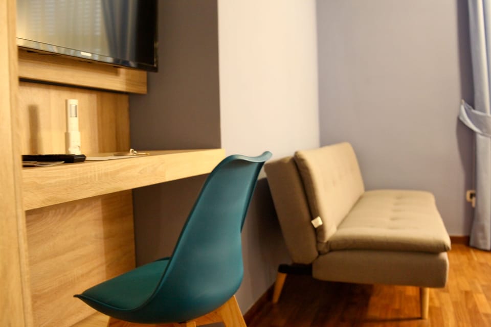 Exclusive Quadruple Room, 1 King Bed with Sofa bed | Free WiFi, bed sheets