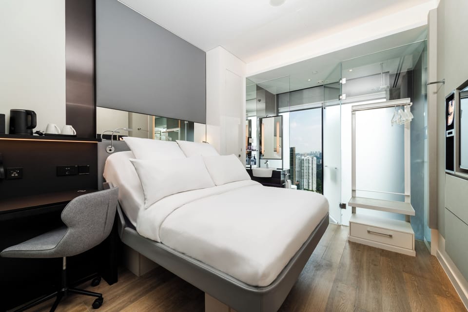 Premium bedding, in-room safe, blackout drapes, soundproofing