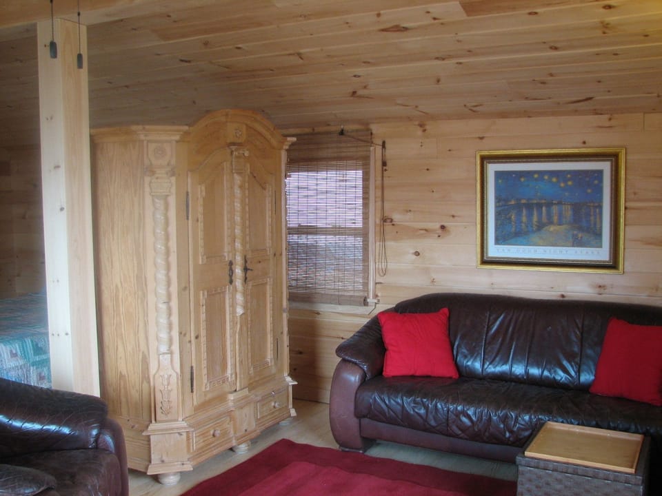 Romantic Chalet, 1 Bedroom, Ocean View, Oceanfront | Living area | TV, fireplace, DVD player