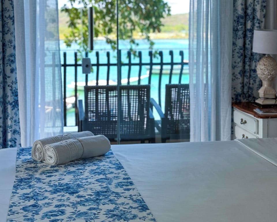 Deluxe Suite, Jetted Tub, Lake View | Desk, blackout drapes, iron/ironing board, free WiFi