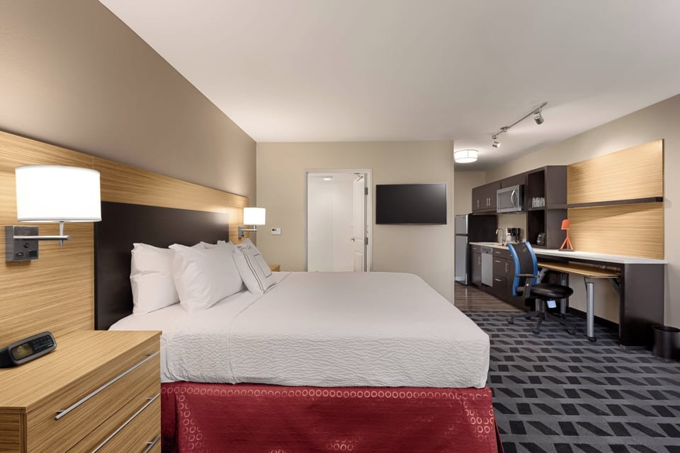 Premium bedding, pillowtop beds, desk, laptop workspace