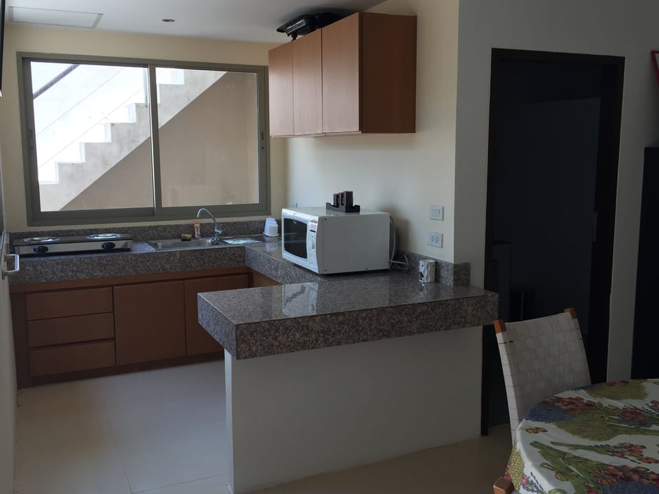 Villa, 5 Bedrooms, Sea View | Private kitchen | Coffee/tea maker, microwave, oven, stovetop