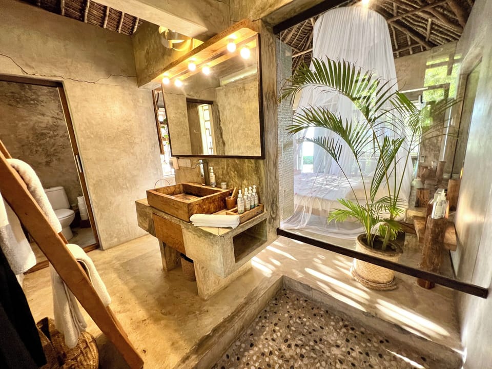 Bungalow, 1 King Bed, Ocean View | Bathroom | Free toiletries, hair dryer, bathrobes, towels